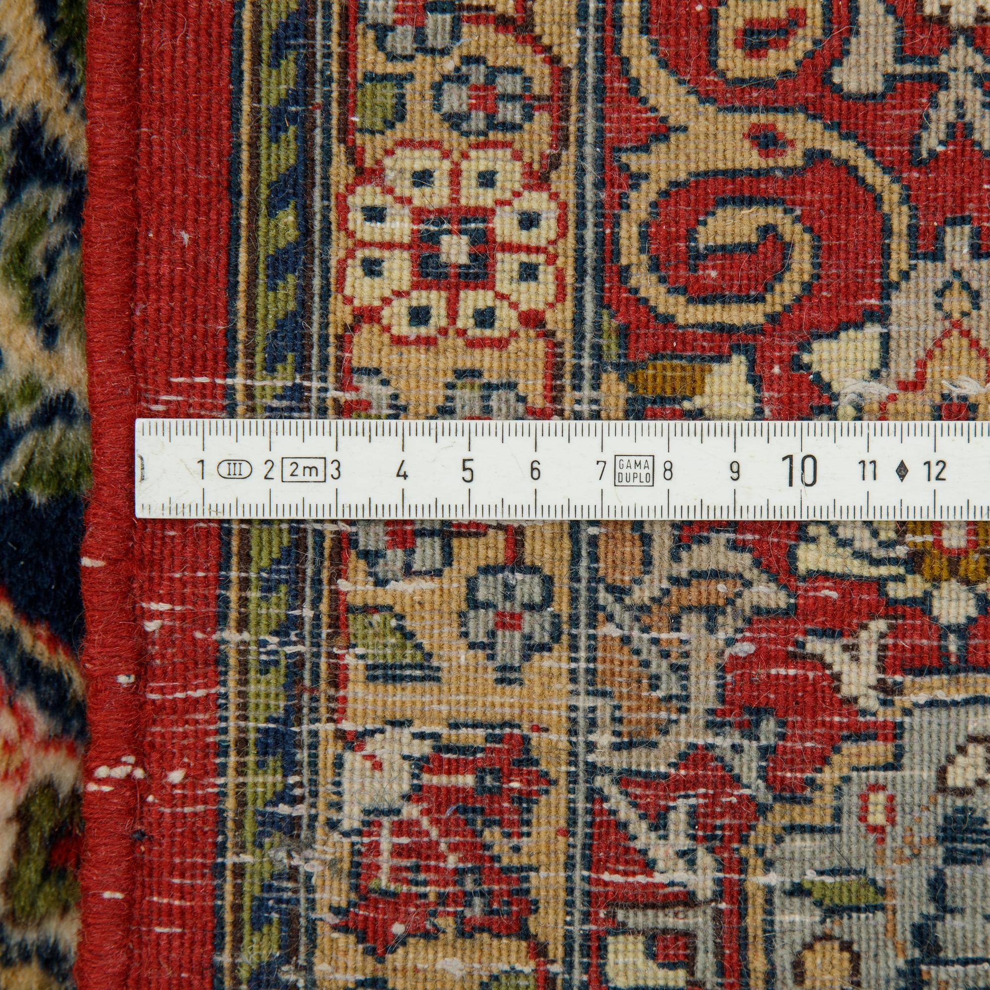 A rug, semi-antique, oriental, ca 238 x 139 cm.