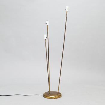 A mid-20th-century three-light floor lamp.