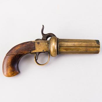 A second half of the 19th Century brass percussion revolver by Johan Engholm.