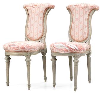 544. A pair of Gustavian chairs by M. Lundberg.