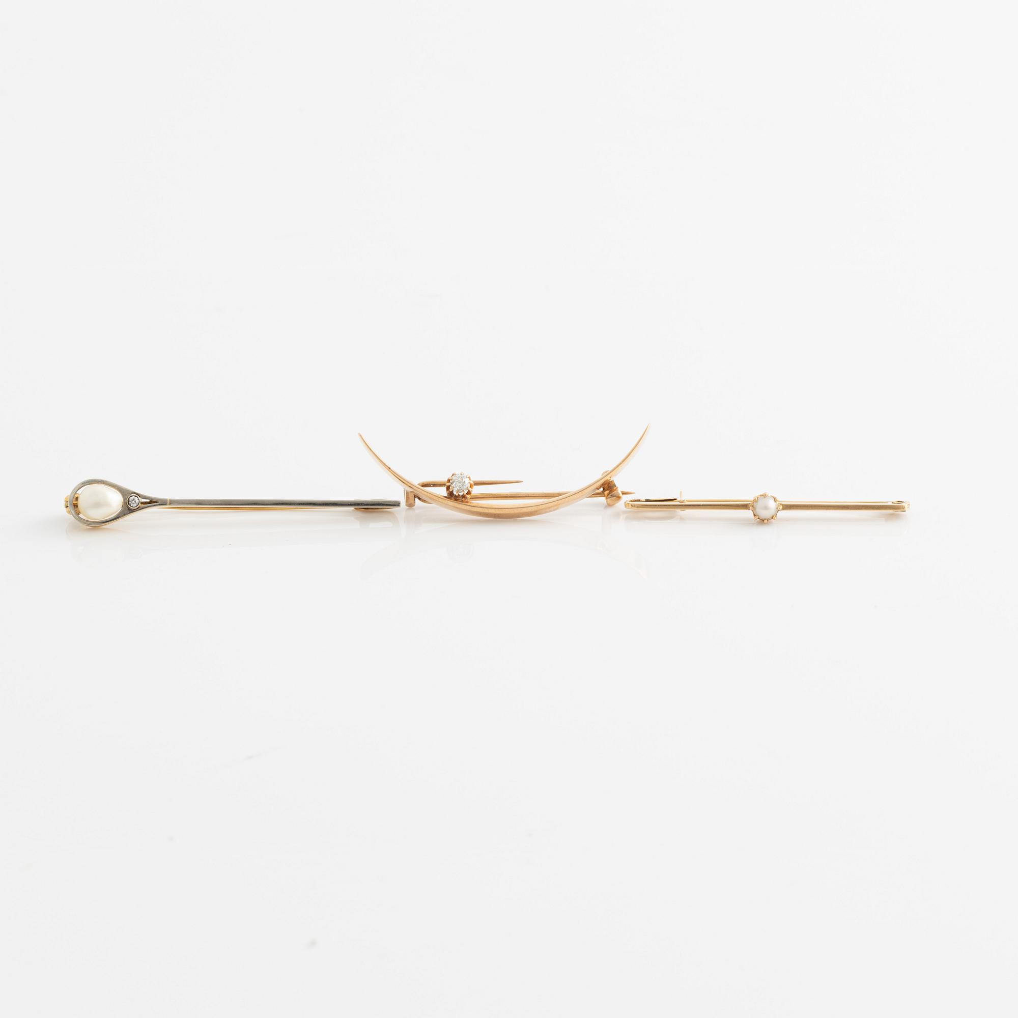 Brooches 3 pcs. gold, with pearls and an antique cut diamond.