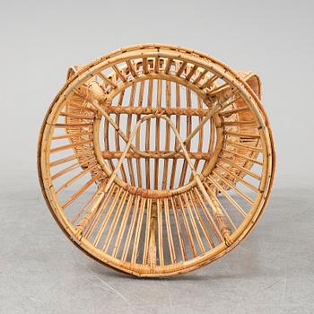 GIO PONTI & LIO CARMINATI, A 'Conte Biancamano' rattan Wingback Armchair for Bonacina, Italy.
