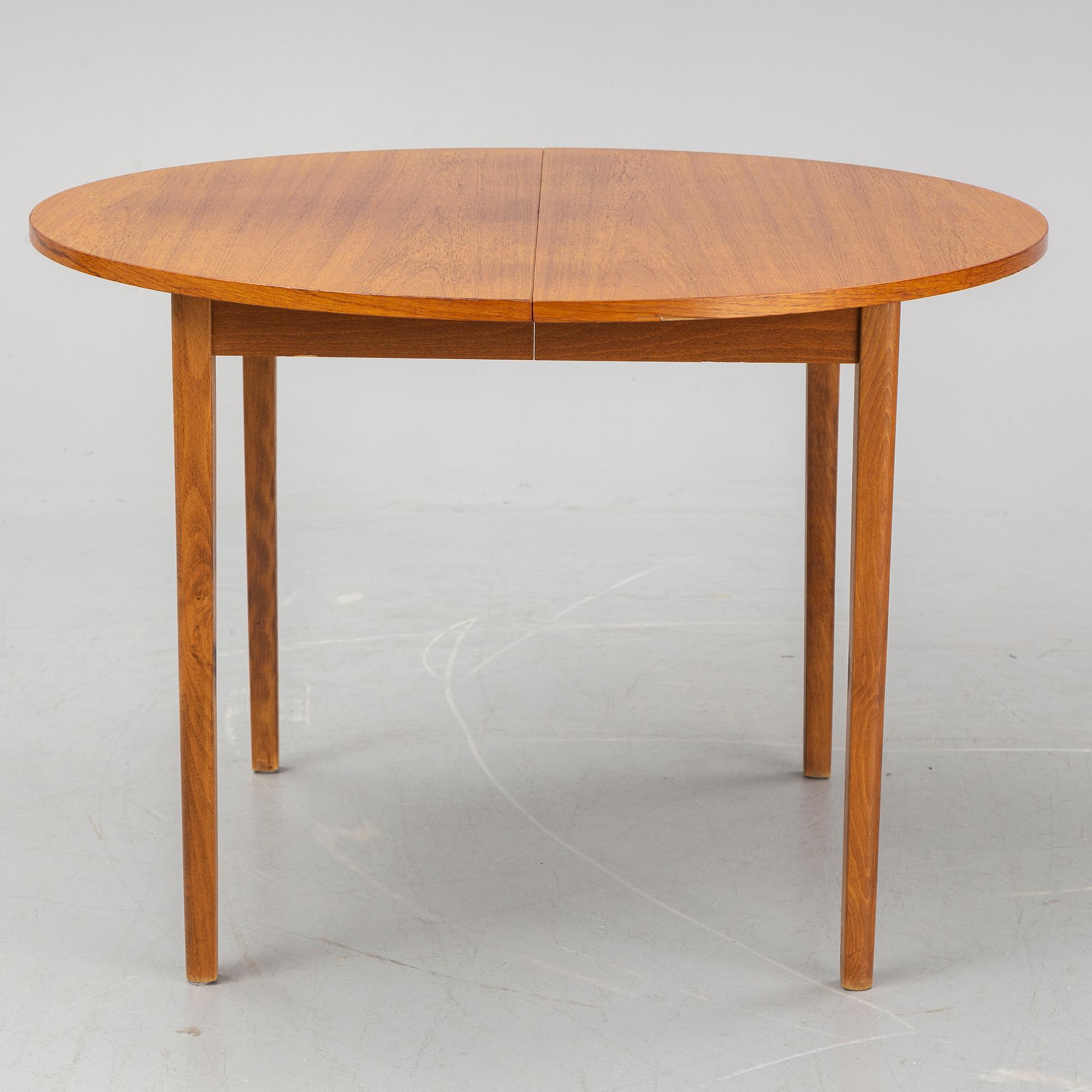 A teak veneered table, second half of the 20th century.