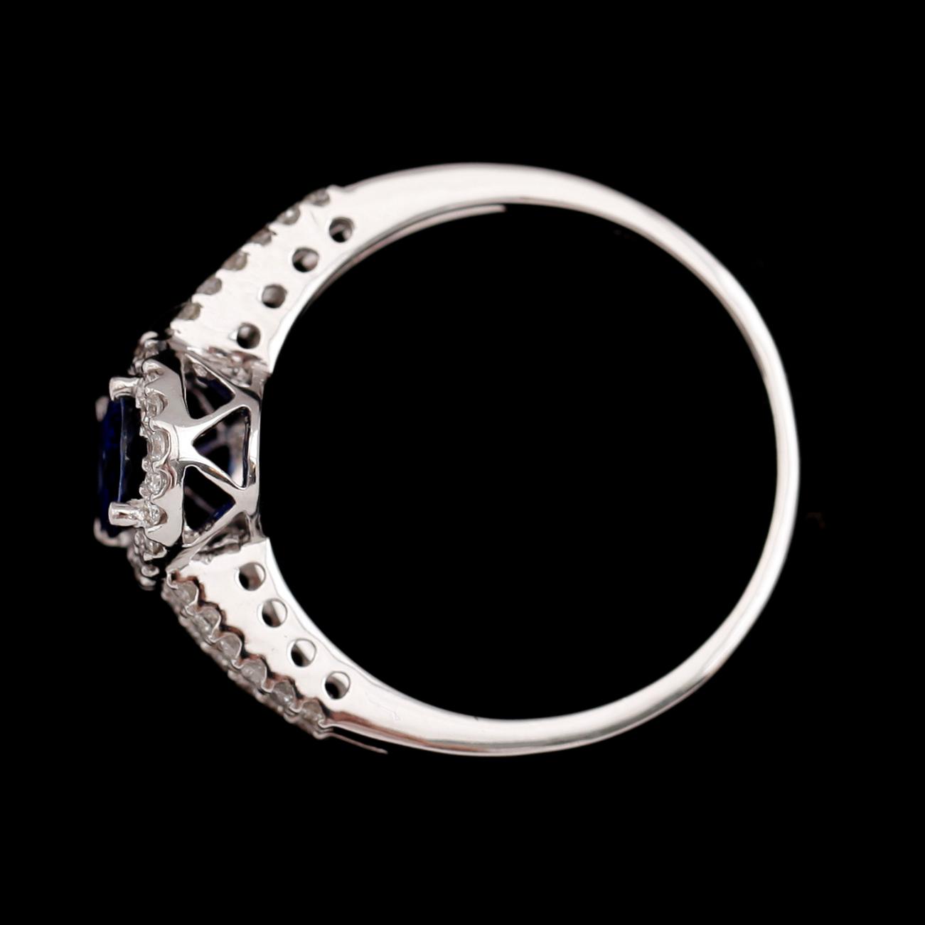 RING, 18 k vitguld, safir ca 0.97 ct, briljantslipade diamanter tot ca 0.30 ct.