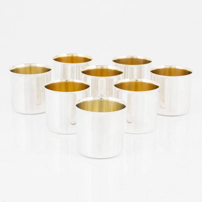 A set of eight parcel gilt Swedish silver vodka cups, bearing the mark of GAB, Stockholm, 1966-1970.