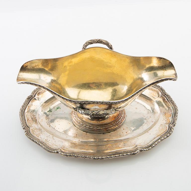 Sauceboat on tray, silver, first half of the 20th century.