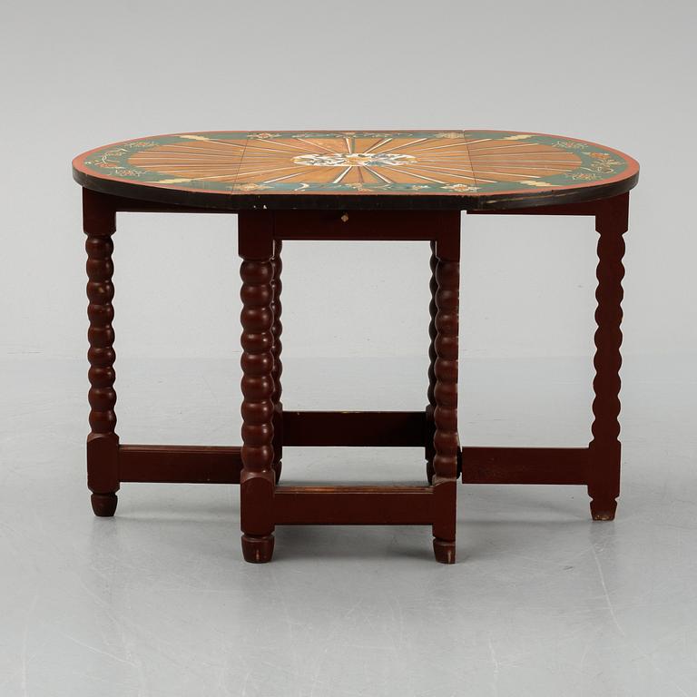A painted Baroque style gate-leg table, early 20th Century.
