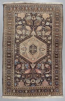 A carpet, semi-antique/Old Ardabil, ca 264 x 272 cm.