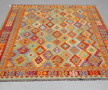 A CARPET, kilim 291 x 202 cm.