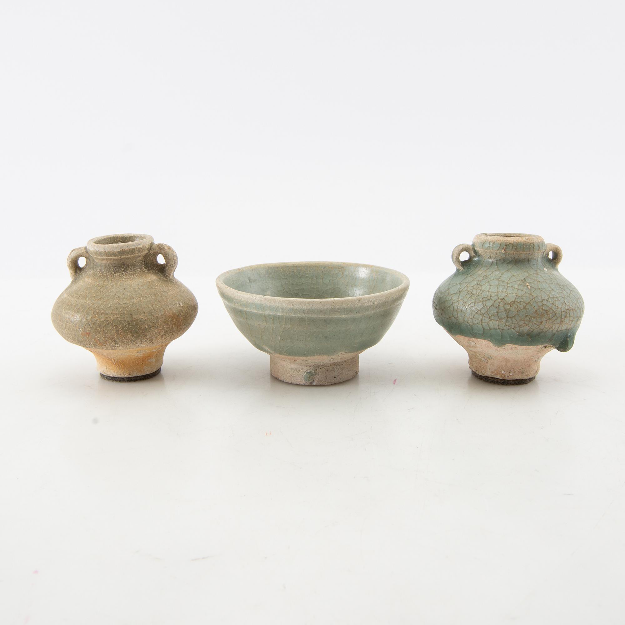 A group of three celadon glazed vessels, Sawankhalok, Thailand, 15th/16th century.