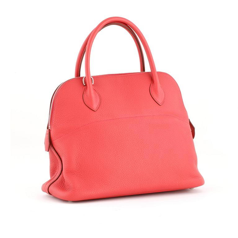 HERMÈS, a pink coral leather bag.