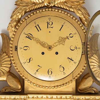 An Empire style wall clock, mid 20th century.