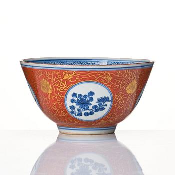 A blue and white bowl with coral red exterior, Japan, 19th century.