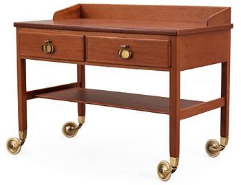 637. A Kerstin Hörlin-Holmquist mahogany and teak trolley, Triva, Nordiska Kompaniet 1960's.