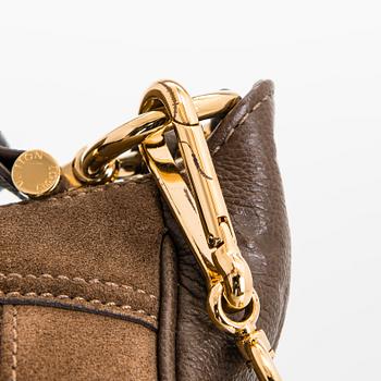 Louis Vuitton, Monogram Empreinte Suede Audacieuse Bag.