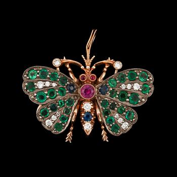 1009. An emerald, ruby, sapphire and diamond brooch in the shape of a butterfly.
