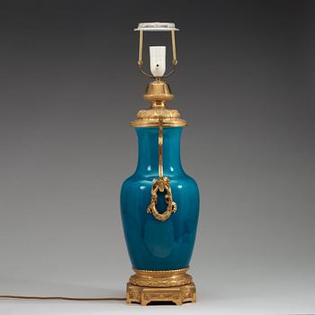 A turquoise glazed bronze mounted porcelain vase, Qing dynasty, 19th century.