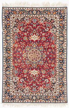 A rug, silk Quum presumably, c. 153 x 104 cm.