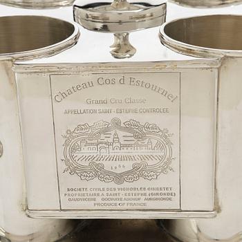 A silver plated four-bottle wine cooler.