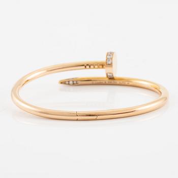 A Cartier bracelet "Juste un clou" in 18K rose gold with round brilliant-cut diamonds.