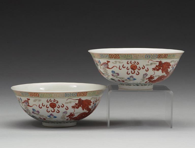 A pair of dragon and phoenix bowls, China, Republic with Qianlong mark.