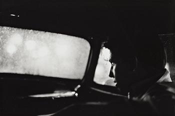 247. Larry Clark, "Untitled (man in car with view of rainy night)", 1963.