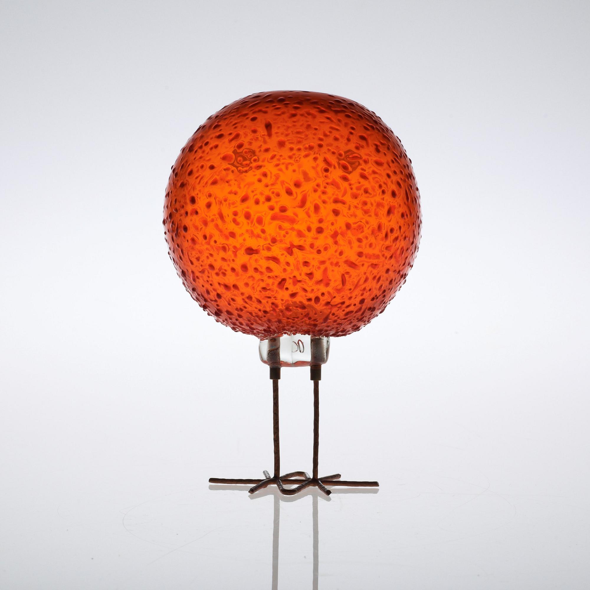 A Peter Pelzel 'Pulcino' glass figure of a bird, copper legs, Italy 1960's.