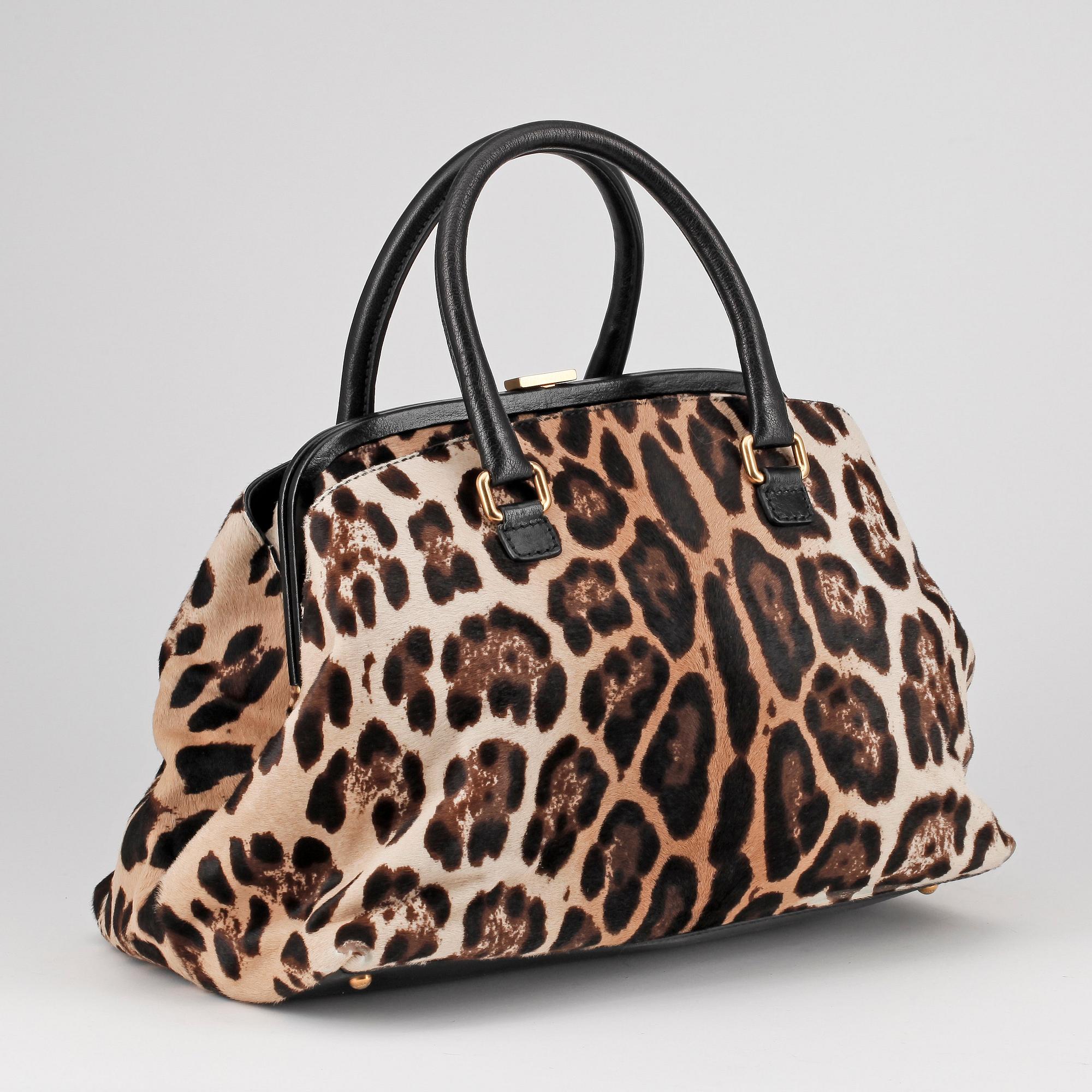 DOLCE & GABBANA, a leopard patterned handbag.