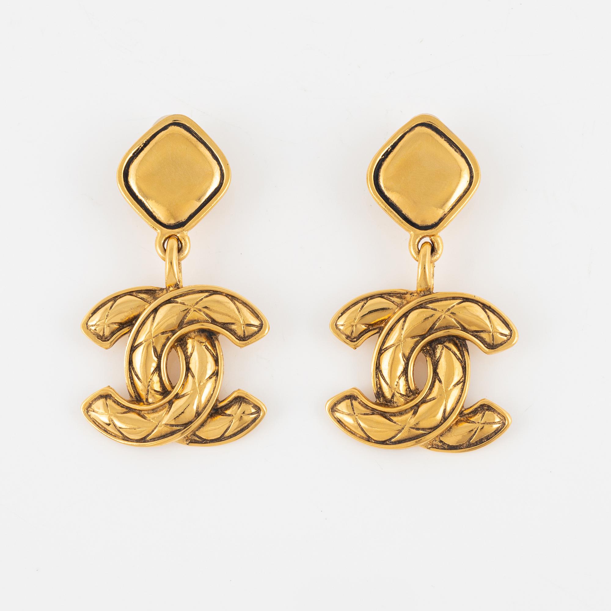 Chanel, a pair of gold tone clip-on earrings, 1990-1992.