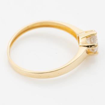 18K gold ring with an old-cut diamond.