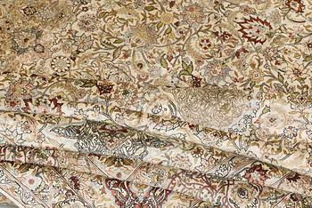 A oriental silk carpet, 350 x 247 cm.