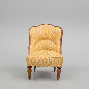 A late 19th century easy chair.