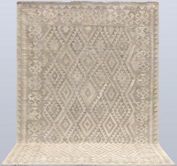 A Kelim carpet, 292 x 208 cm.