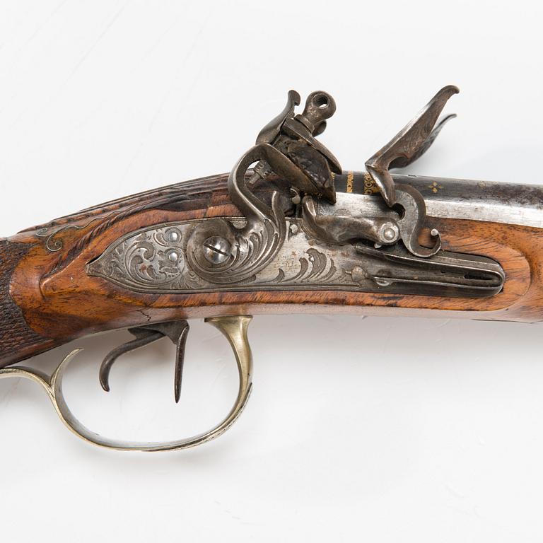 A late 18th Century flintlock shotgun.