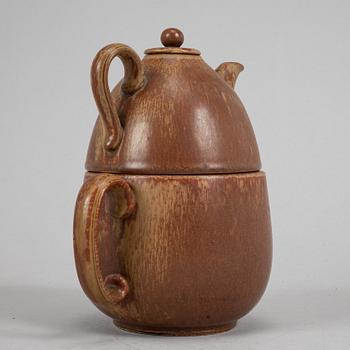 Tea pot, two bowls, two creamers, and a vase by Gunnar Nylund, stoneware, Rörstrand.