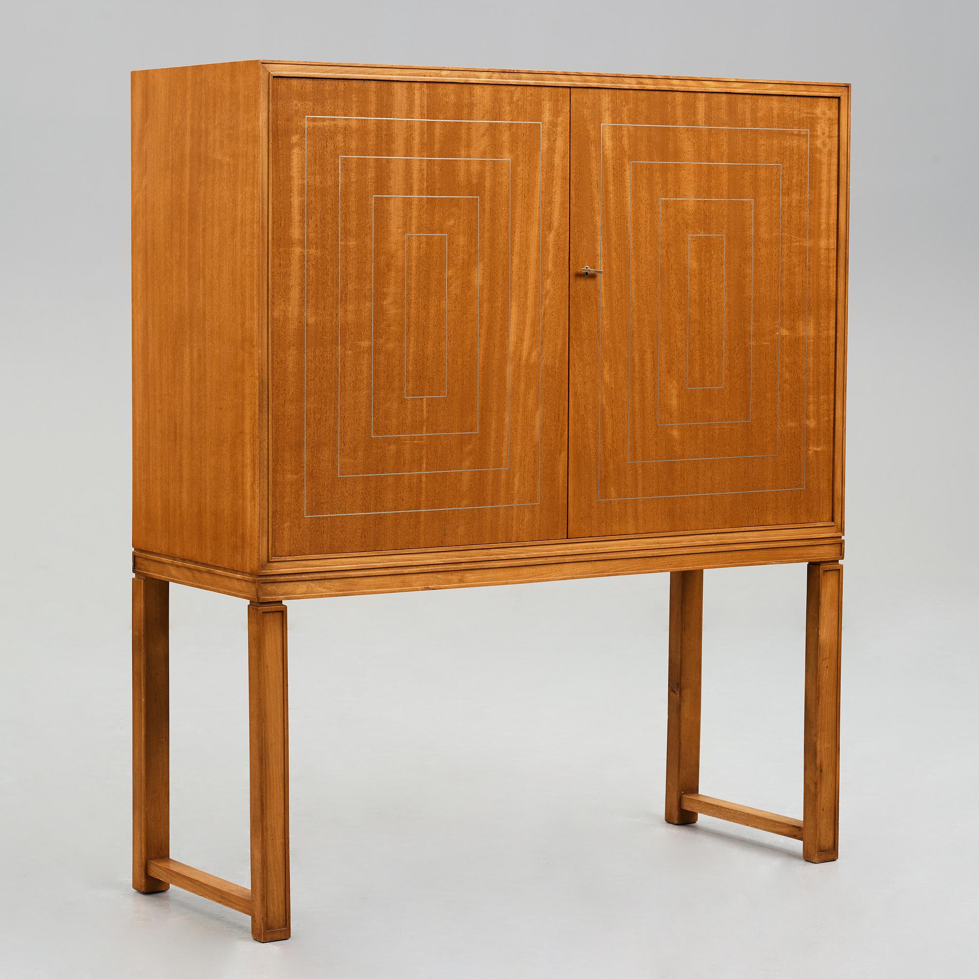 A Swedish Modern cabinet, 1930's-40's.