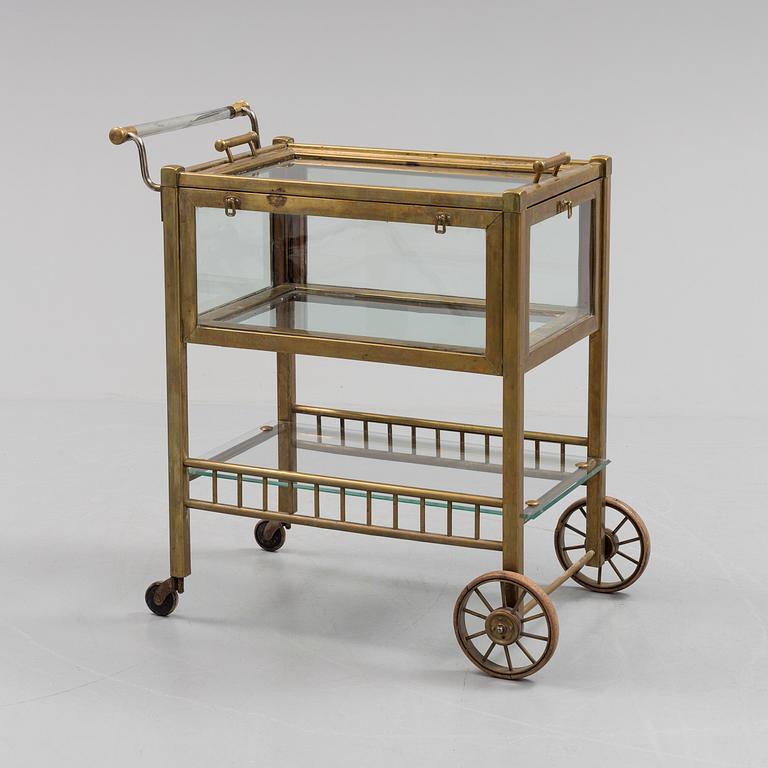 A early brass serving trolley.