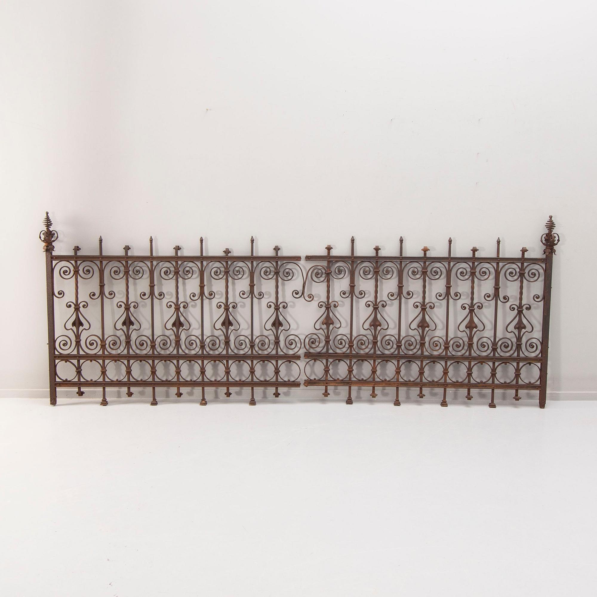 A cast iron fence around 1900.