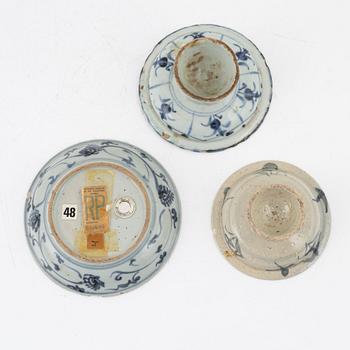 A shipwreck bowl, late Ming dynasty (1368-1644), and two bowls, South East Asia, around 1900.