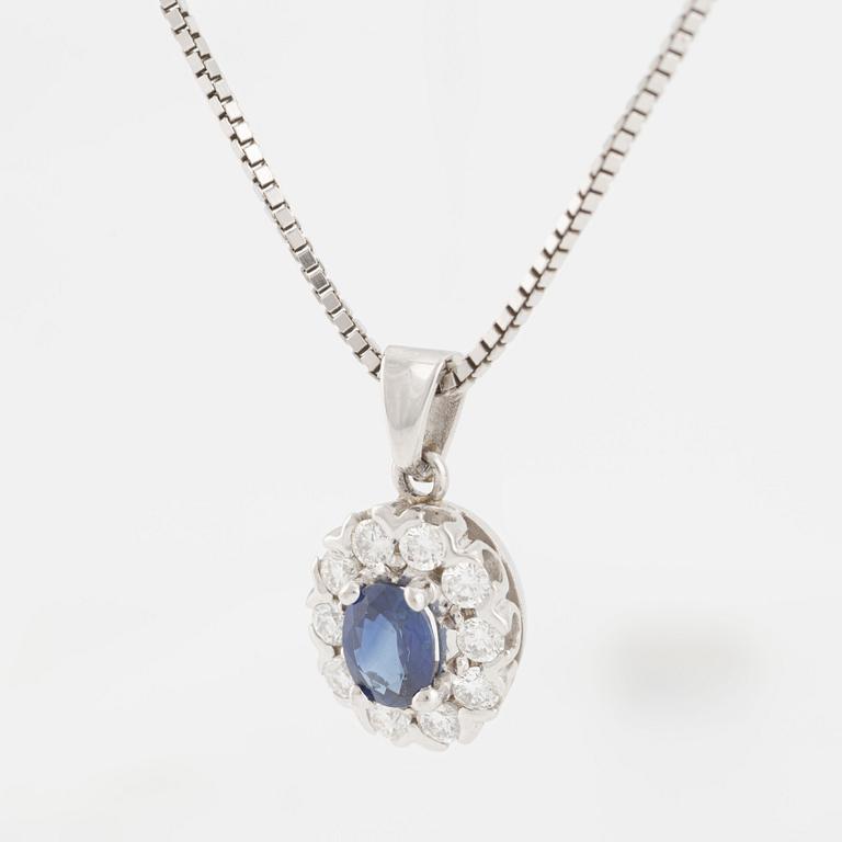 Hänge med kedja 18K guld med en safir och runda briljantslipade diamanter.