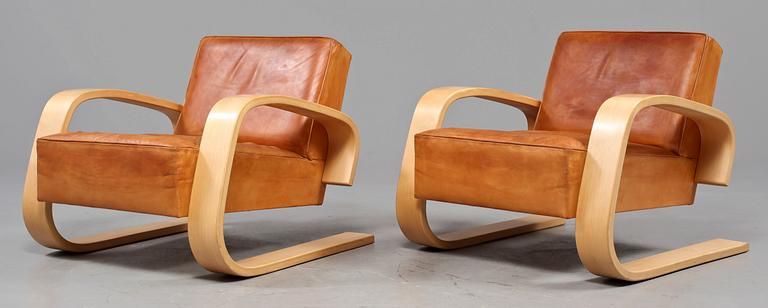 A pair of Alvar Aalto 'Nr 400' elk skin and birch armchairs, Artek, Finland.