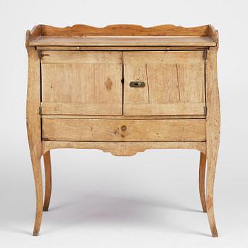 A Swedish rococo chamberpot cupboard, later part 18th century.