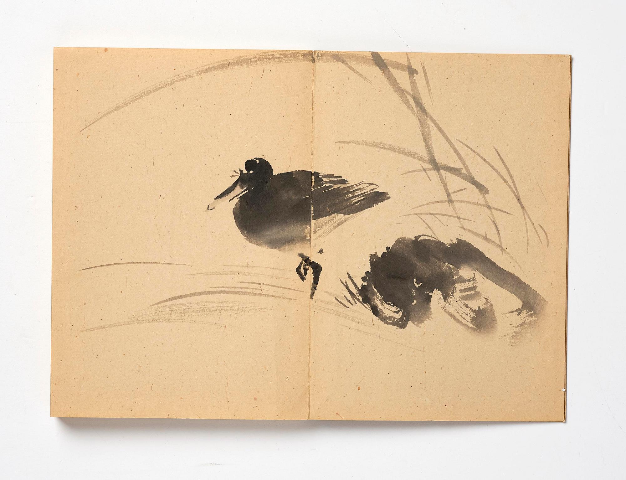 Two Chinese albums, one empty, early 20th century.