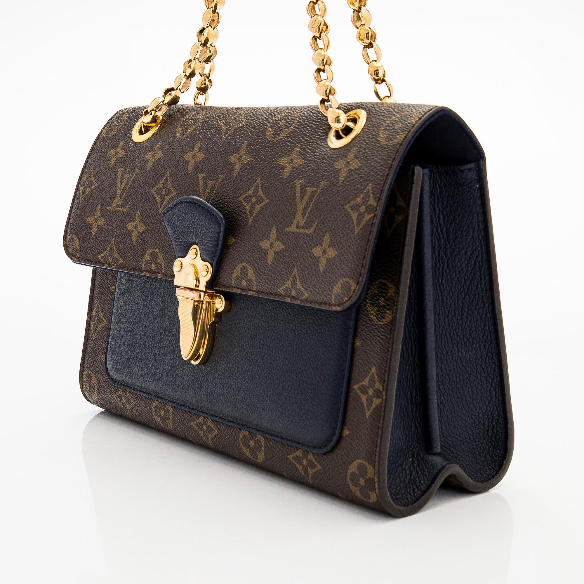 Louis Vuitton, a Monogram 'Victoire' bag.