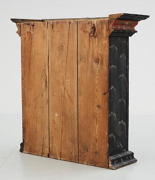 A Swedish wall cabinet, dated 1820.