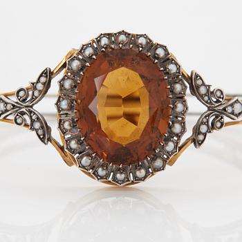 A BANGLE.