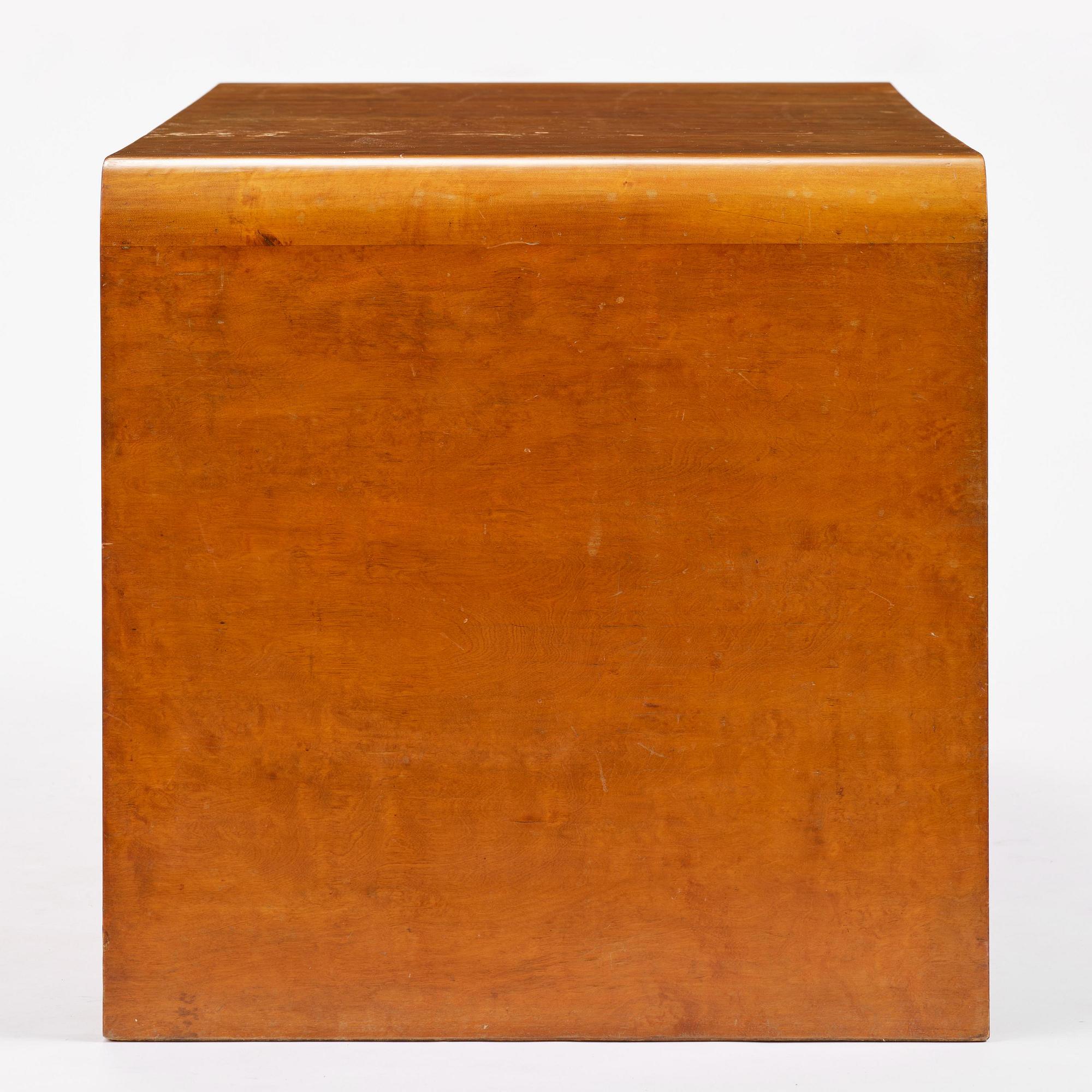 Swedish Modern, a birch veneered coffee table, 1930s-40s.