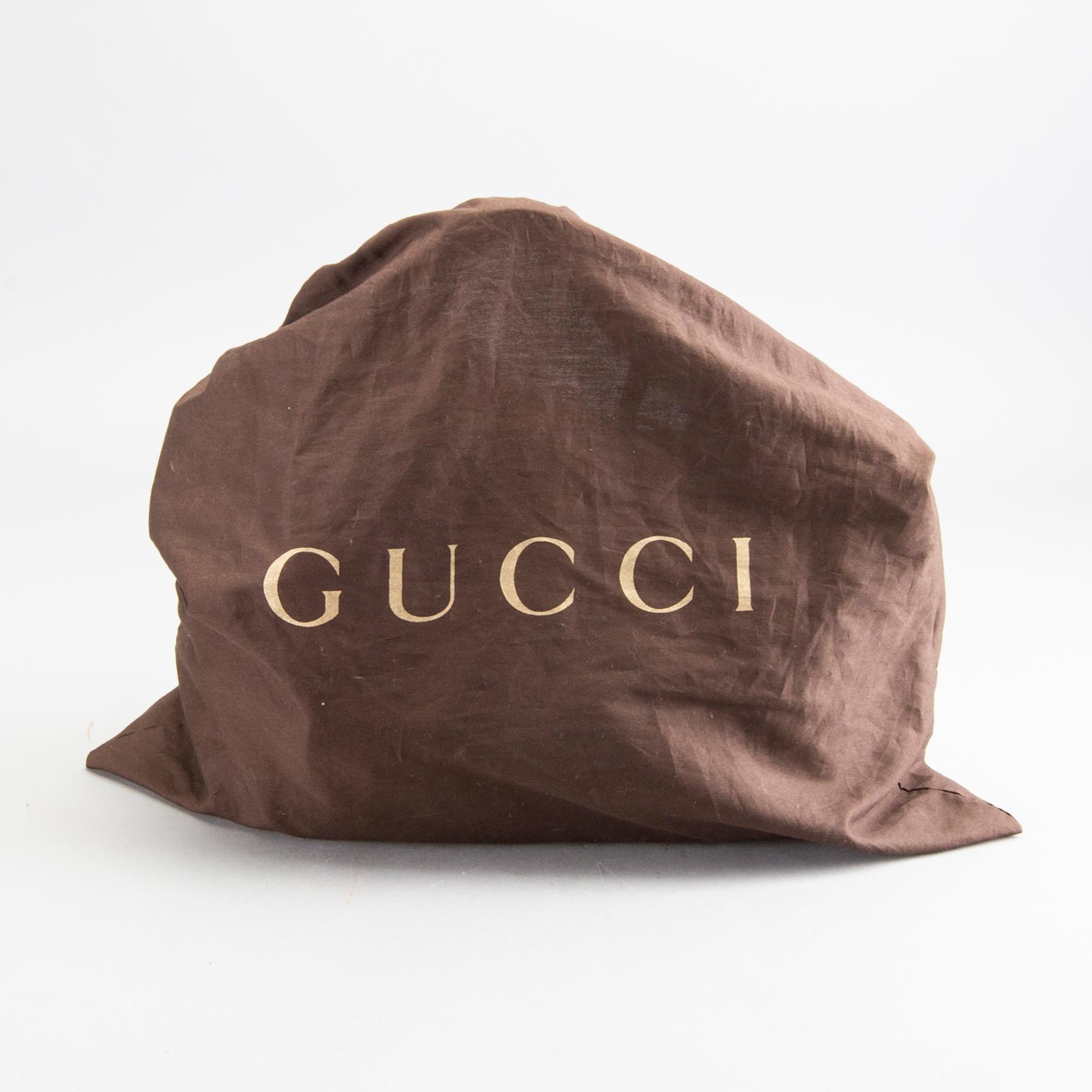 GUCCI, väska, "Black diamante velvet and leather stirrup Top- handle bag".