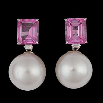1295. A pair of cultured South sea pearl and pink topaz earrings.