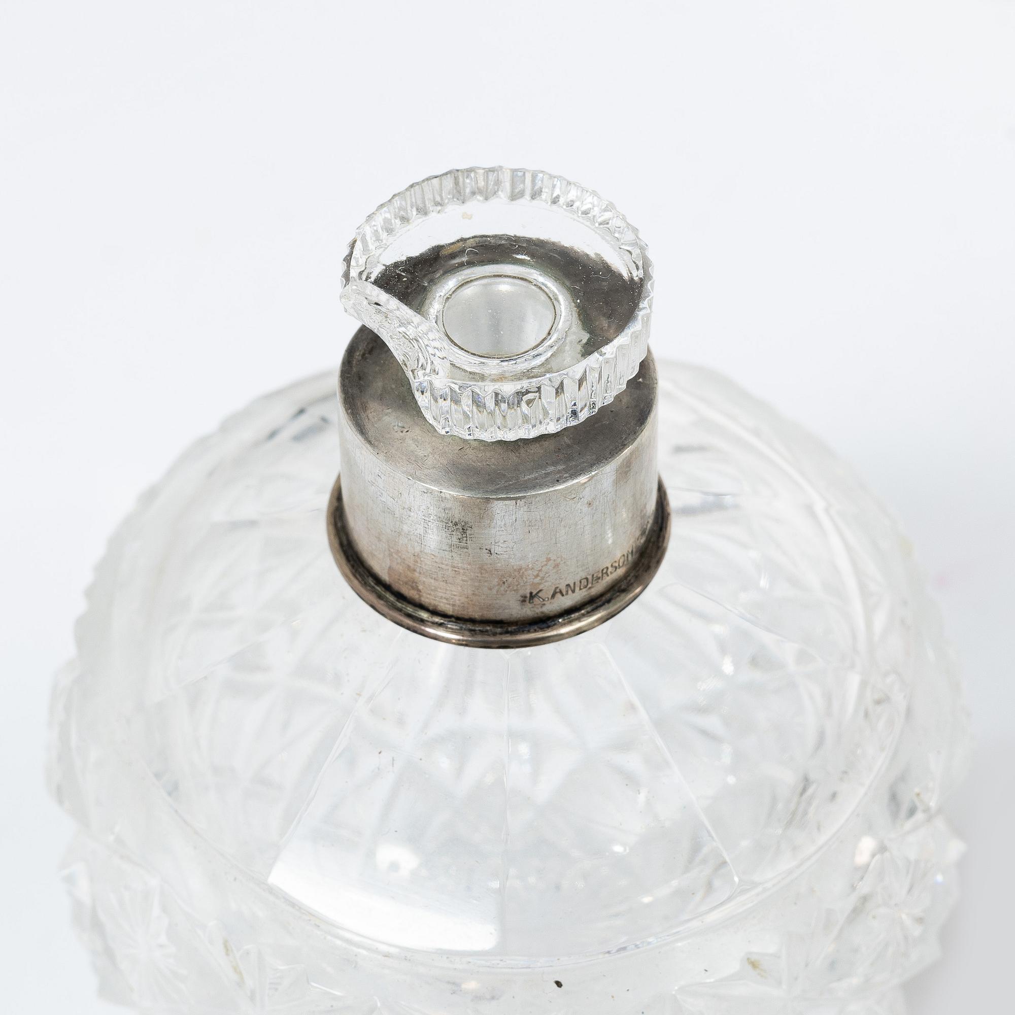A K.Andersson silver and cut glass 'toilette set', monogrammed 'PG'. (11 pieces).
